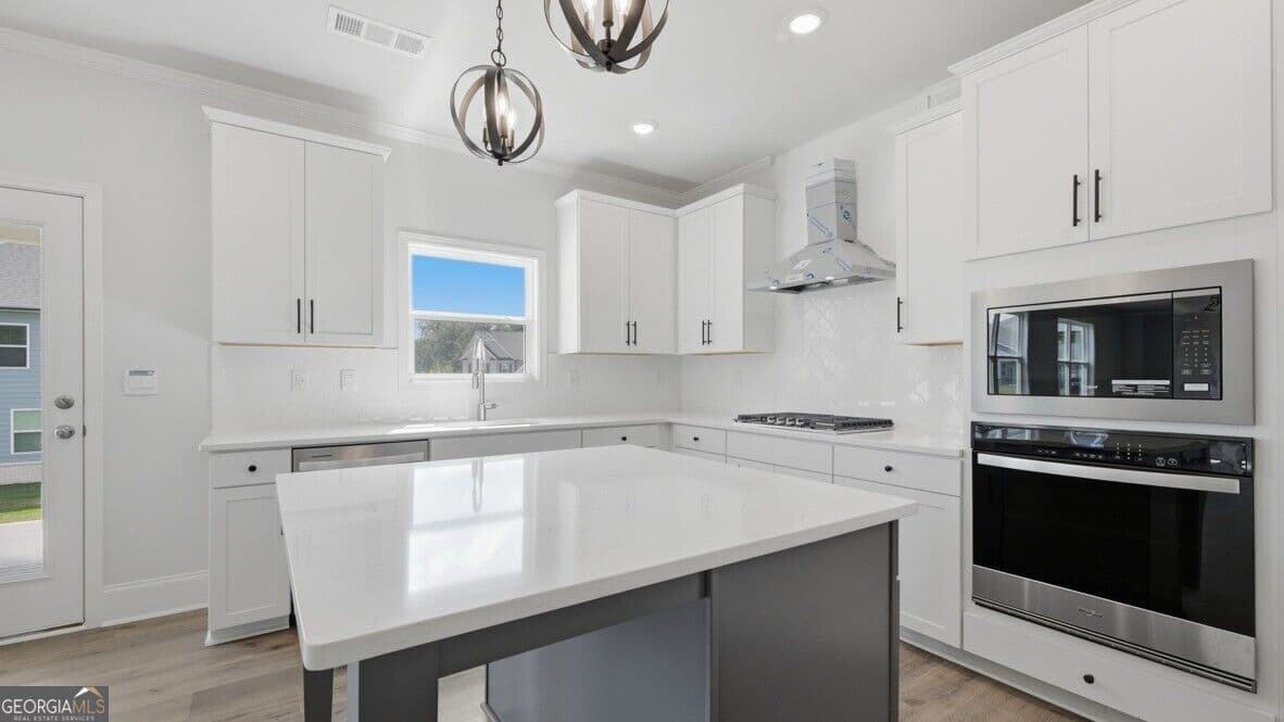 5 bedroom, 4 bathroom, 3,363 sq ft single family residence for sale at 7169 Bocholt Drive, South Fulton, GA 30349 — photo 8