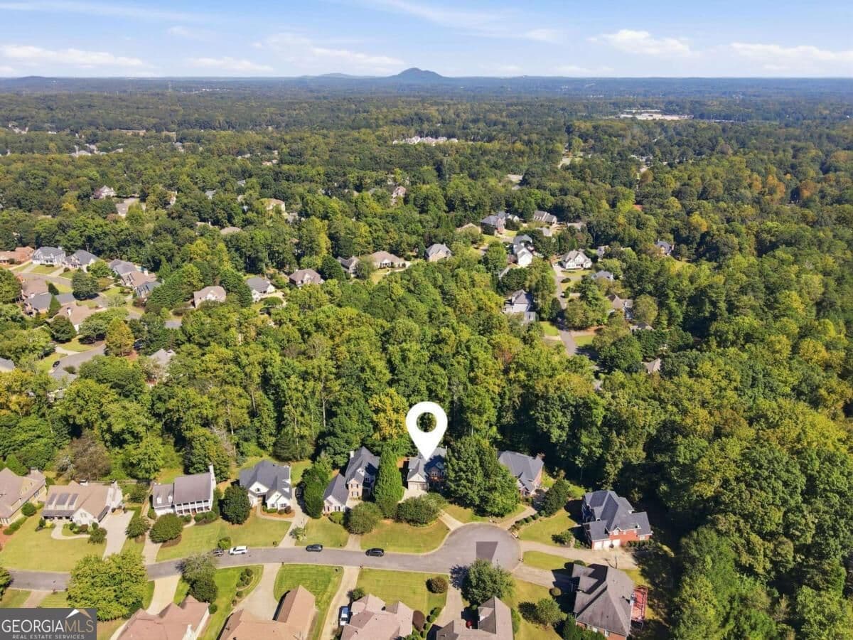 6 bedroom, 4.5 bathroom, 5,589 sq ft single family residence for sale at 1223 Oakleigh Valley Drive, Powder Springs, GA 30127 — photo 10