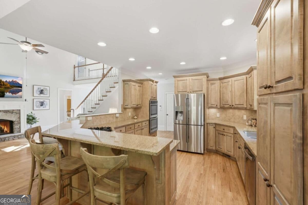 6 bedroom, 4.5 bathroom, 5,589 sq ft single family residence for sale at 1223 Oakleigh Valley Drive, Powder Springs, GA 30127 — photo 4
