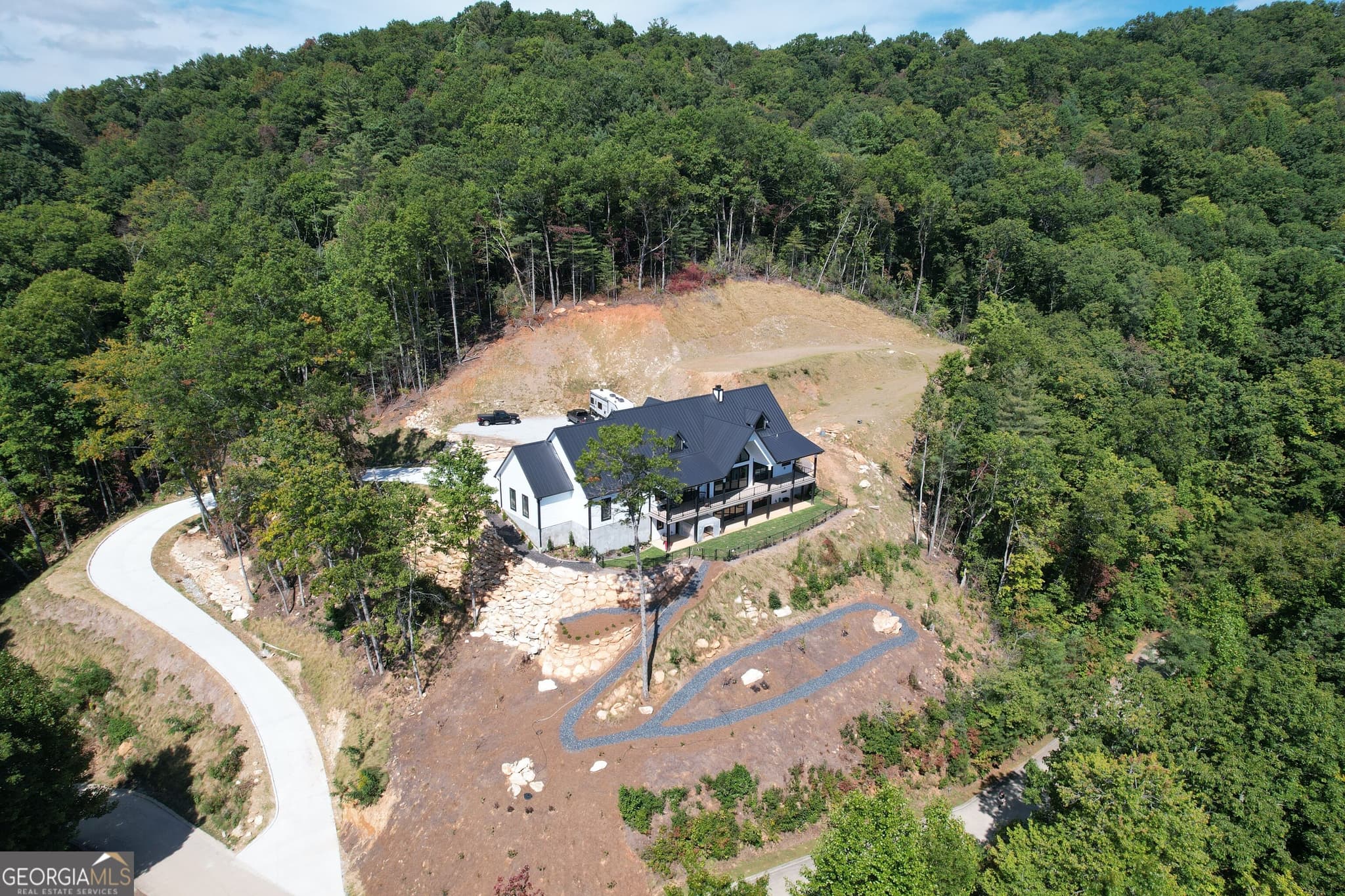 4 bedroom, 5 bathroom, 5,048 sq ft single family residence for sale at 603 Hoover Trail, Clayton, GA 30525 — photo 2