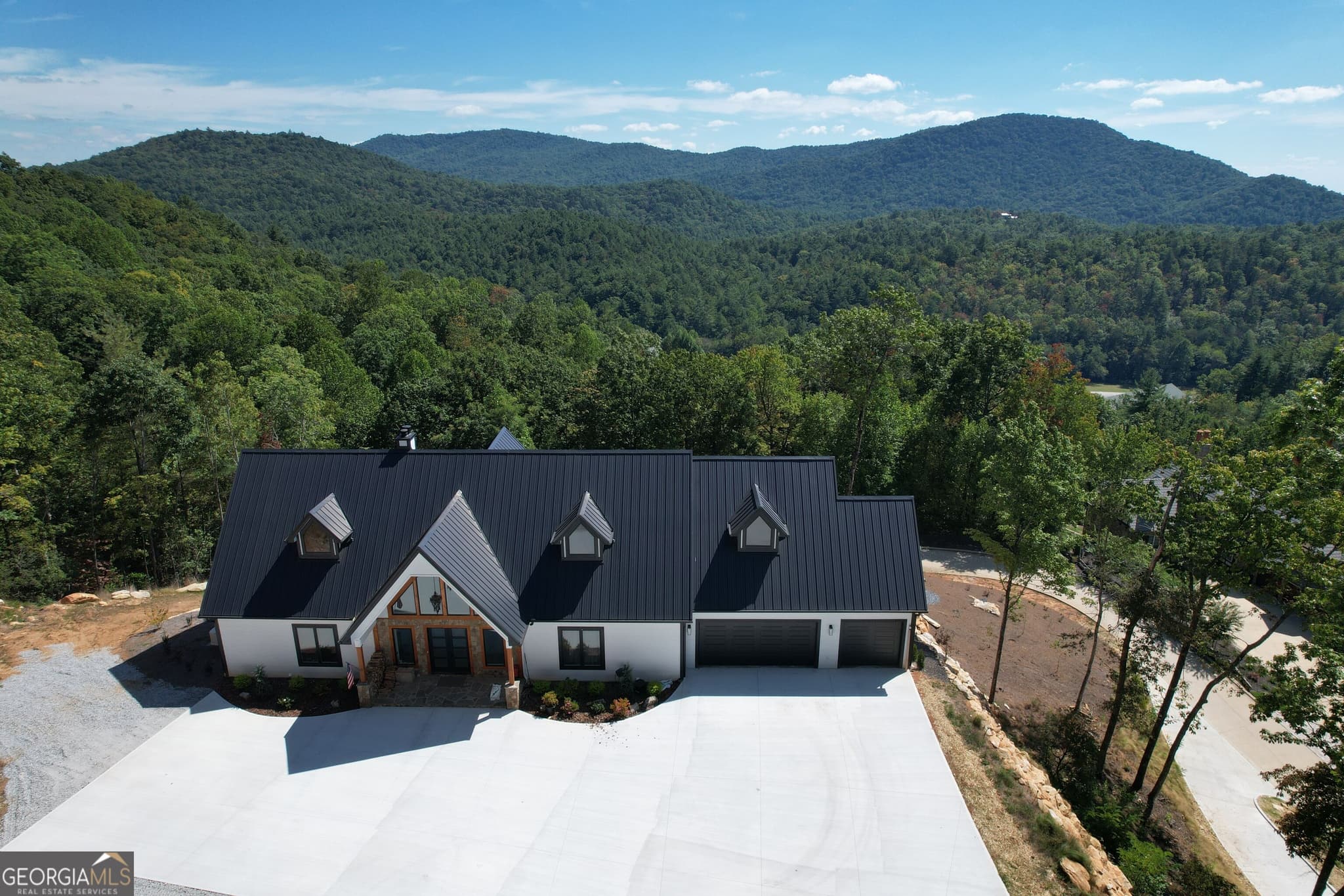 4 bedroom, 5 bathroom, 5,048 sq ft single family residence for sale at 603 Hoover Trail, Clayton, GA 30525 — photo 1 of 27