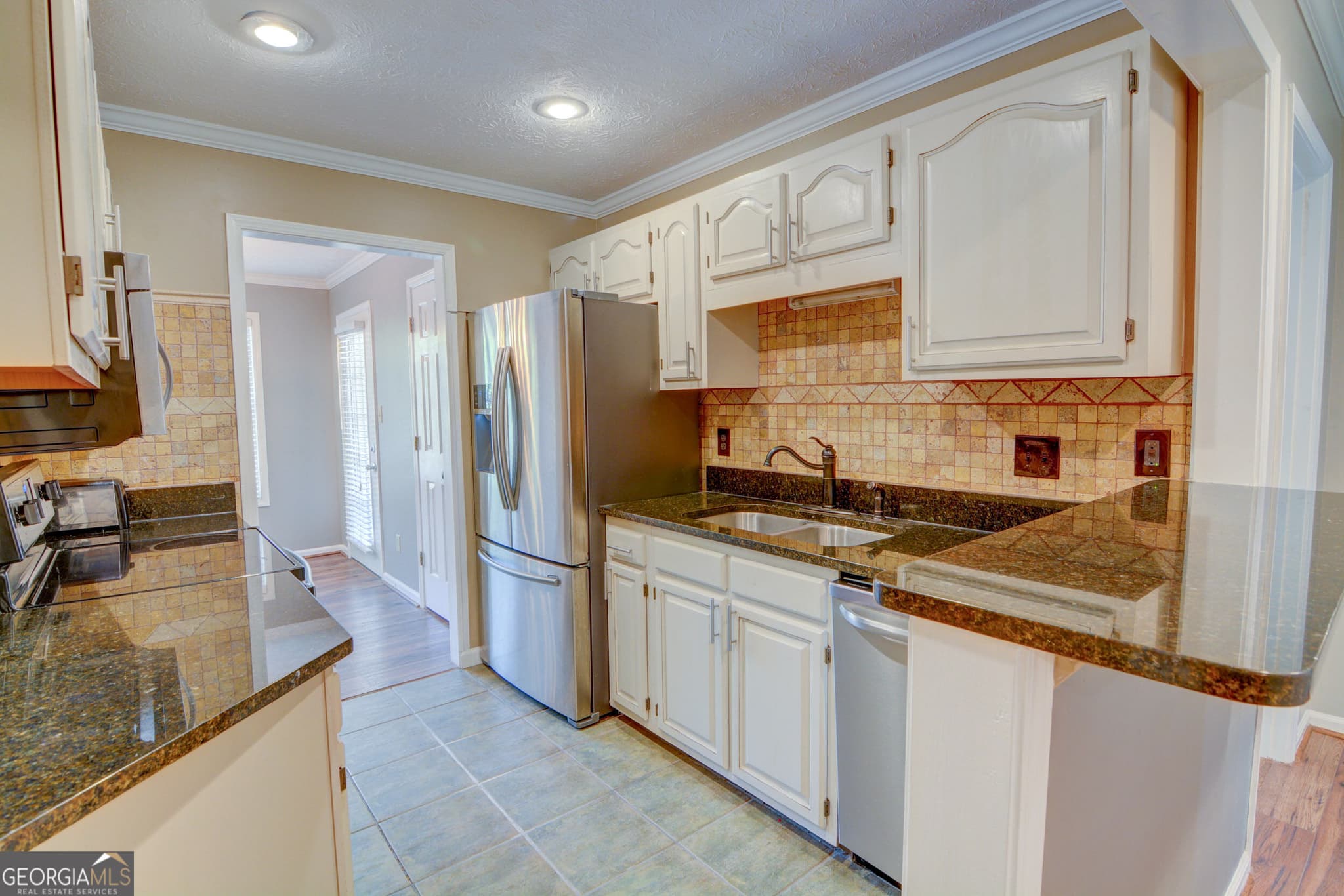 2 bedroom, 2 bathroom, 1,302 sq ft single family residence for sale at 904 Peachtree Forest Terrace, Peachtree Corners, GA 30092 — photo 9
