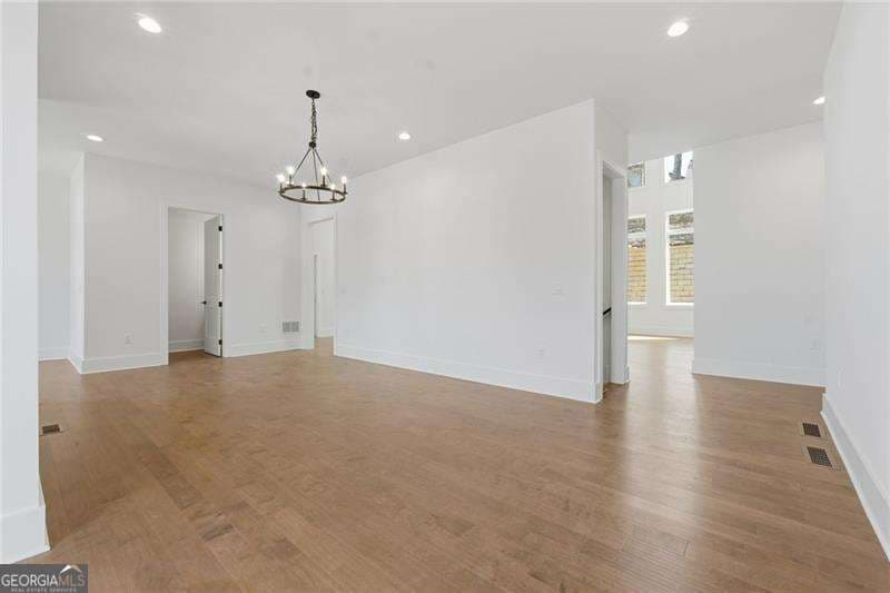 5 bedroom, 4 bathroom, 3,687 sq ft single family residence for sale at 3985 Clifton Hill Court, Cumming, GA 30040 — photo 6
