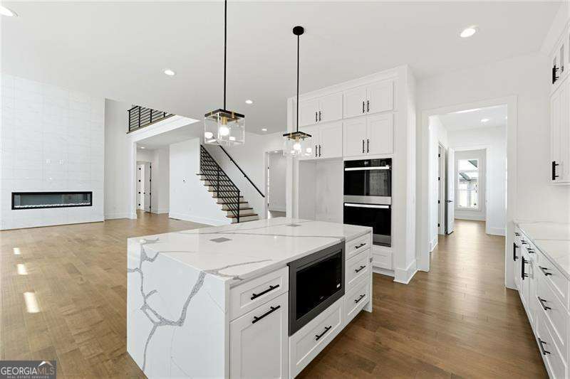 5 bedroom, 4 bathroom, 3,687 sq ft single family residence for sale at 3985 Clifton Hill Court, Cumming, GA 30040 — photo 10