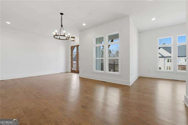 5 bedroom, 4 bathroom, 3,687 sq ft single family residence for sale at 3985 Clifton Hill Court, Cumming, GA 30040 — photo 4