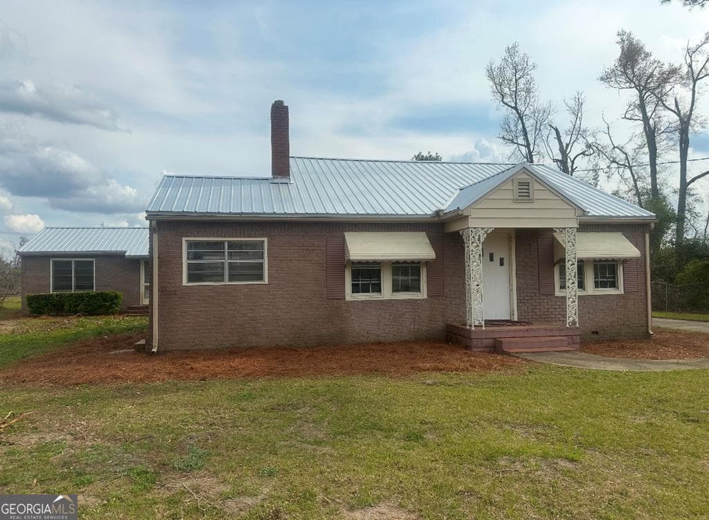 3 bedroom, 2 bathroom, 2,521 sq ft single family residence sold at 65 SW Third Avenue, Glenwood, GA 30428