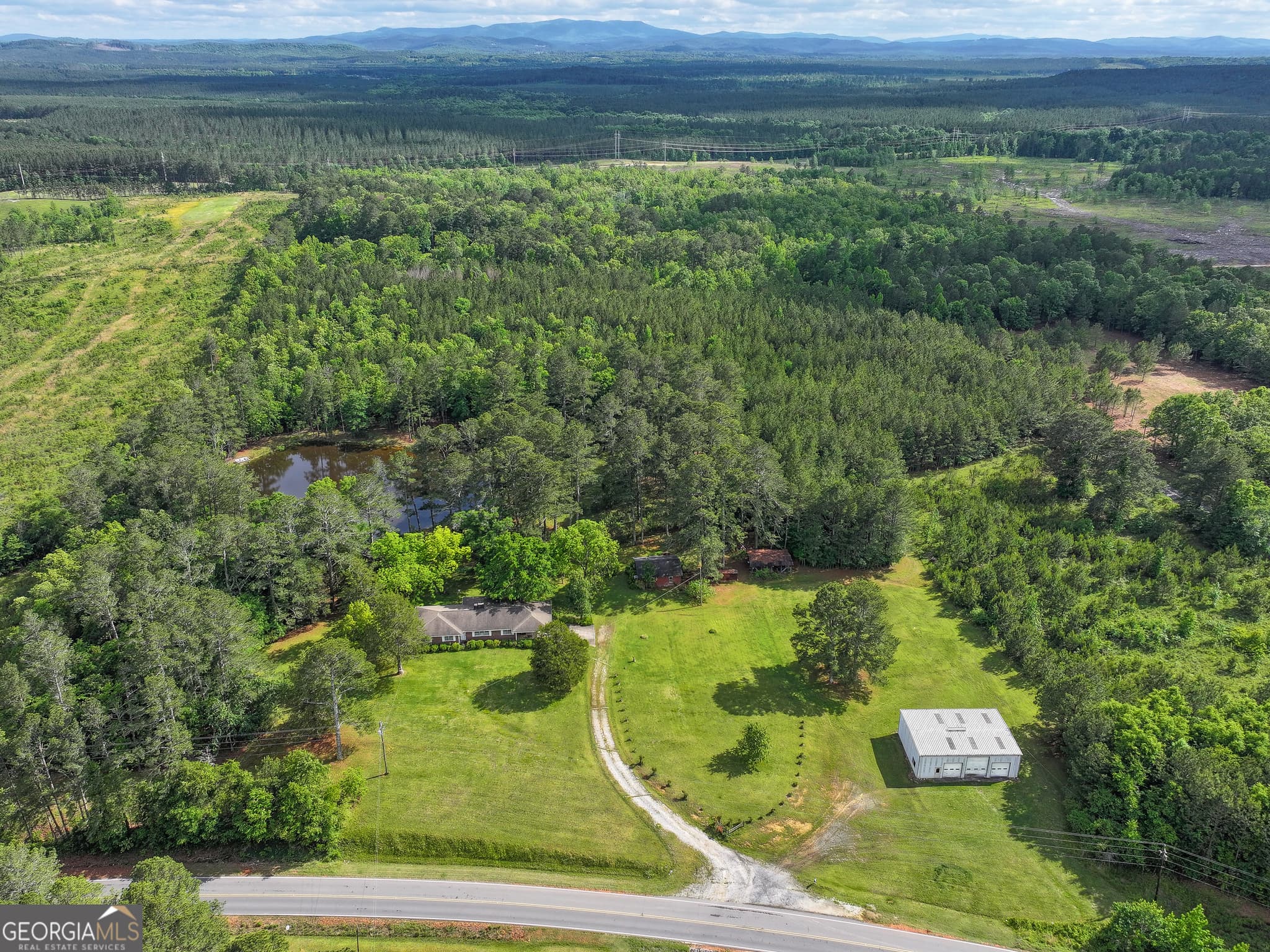 4 bedroom, 2 bathroom, 2,215 sq ft farm for sale at 7517 Blacks Bluff Road, Cave Spring, GA 30124