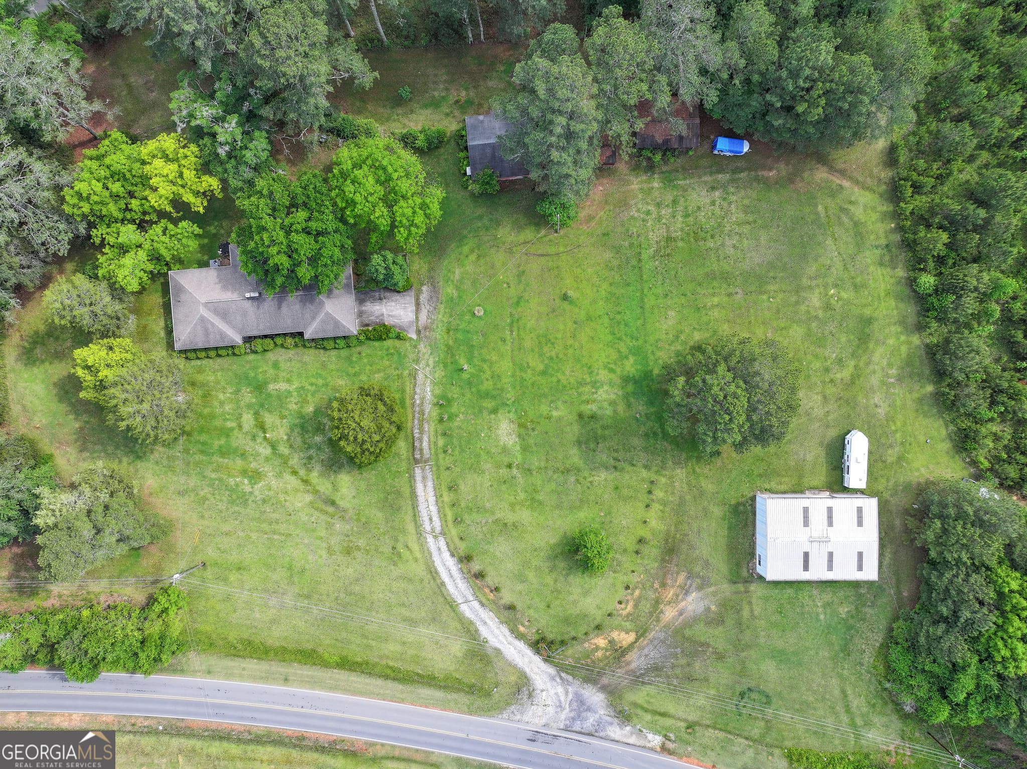4 bedroom, 2 bathroom, 2,215 sq ft farm for sale at 7517 Blacks Bluff Road, Cave Spring, GA 30124 — photo 8