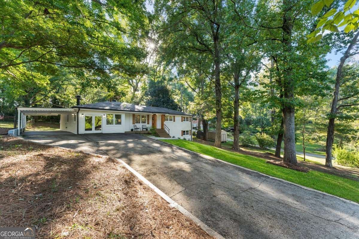 4 bedroom, 3 bathroom, 1,897 sq ft single family residence for sale at 4995 Doby Lane, Austell, GA 30106 — photo 3