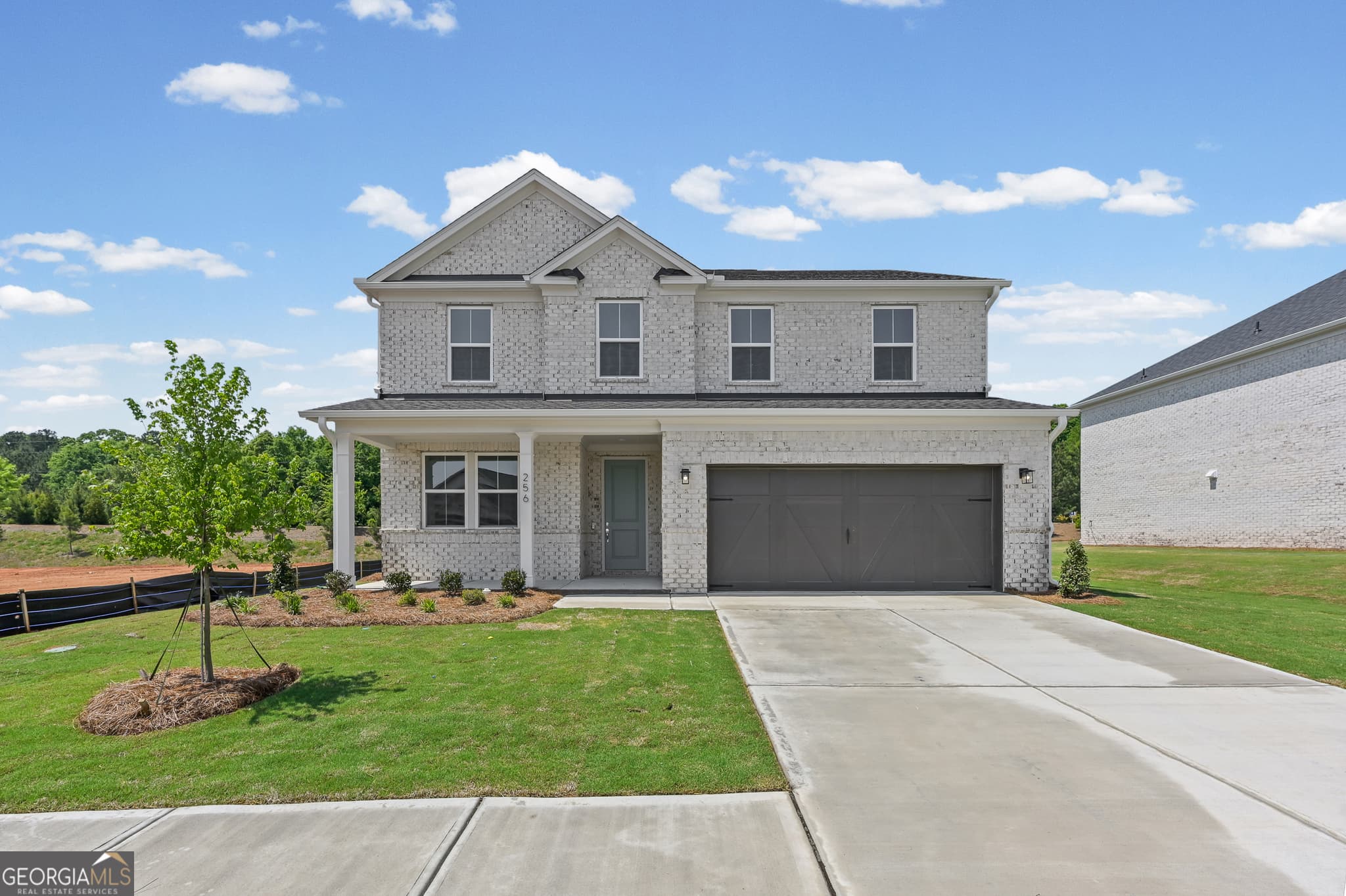 5 bedroom, 3 bathroom, 2,266 sq ft single family residence for sale at 256 Nesta Grove, Locust Grove, GA 30248 — photo 2