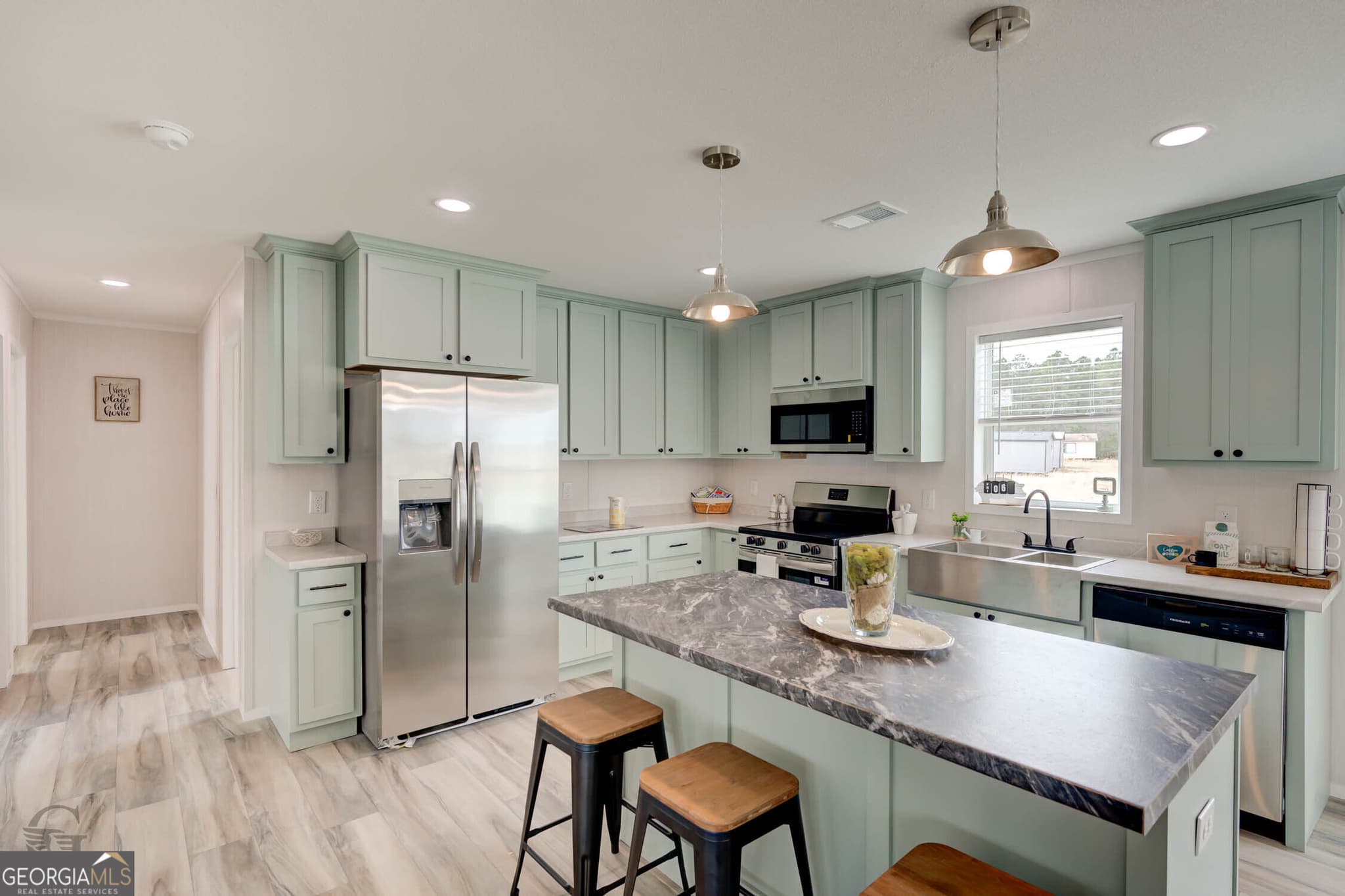 4 bedroom, 2 bathroom, 1,740 sq ft single family residence for sale at 109 Stewart Avenue North East, Milledgeville, GA 31061 — photo 5