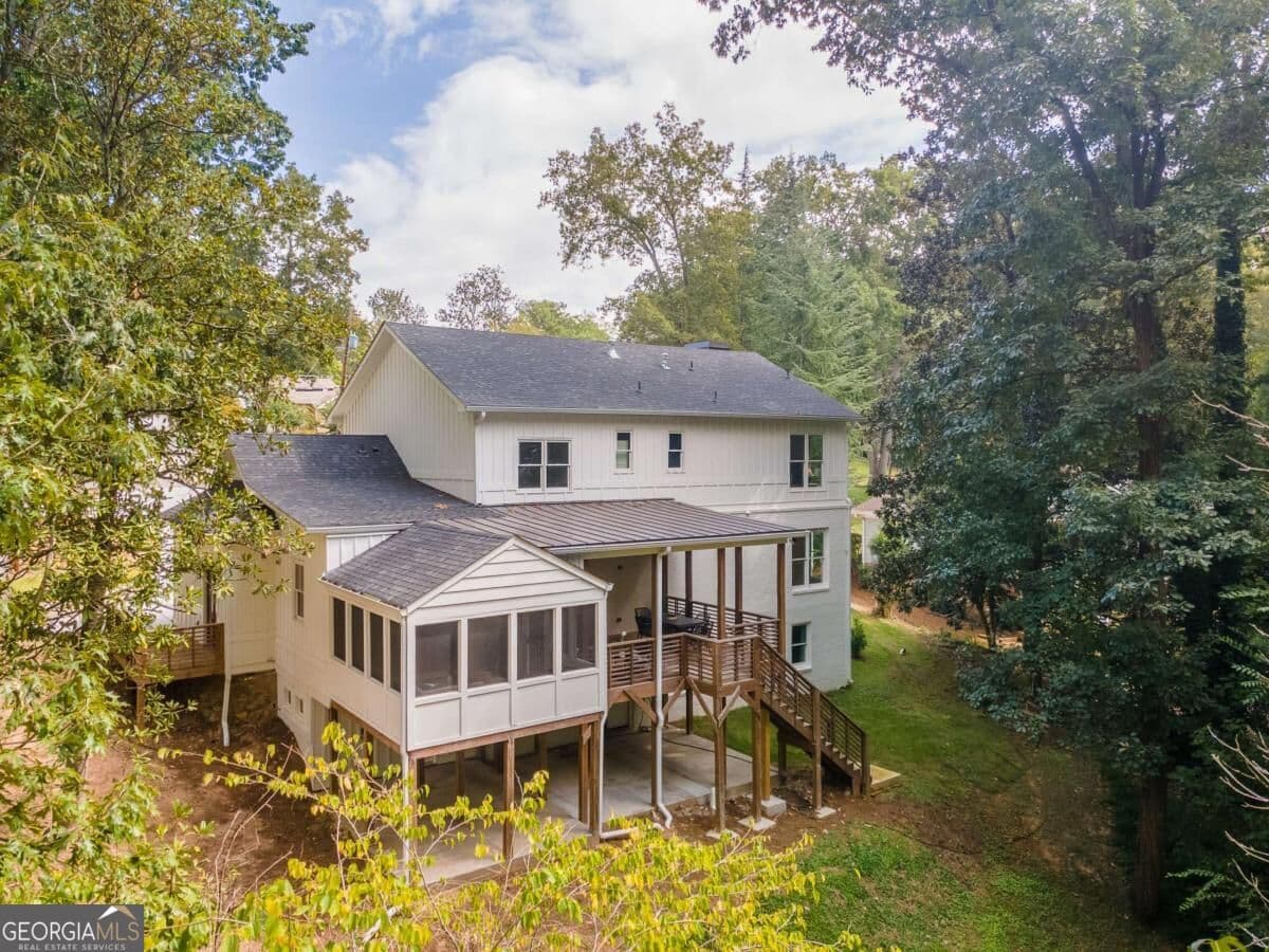 6 bedroom, 6 bathroom, 5,519 sq ft single family residence for sale at 6434 Cherry Tree Lane, Sandy Springs, GA 30328 — photo 2