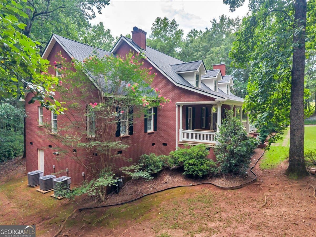 6 bedroom, 5.5 bathroom, 6,412 sq ft single family residence for sale at 222 Newton Drive, Forsyth, GA 31029 — photo 5
