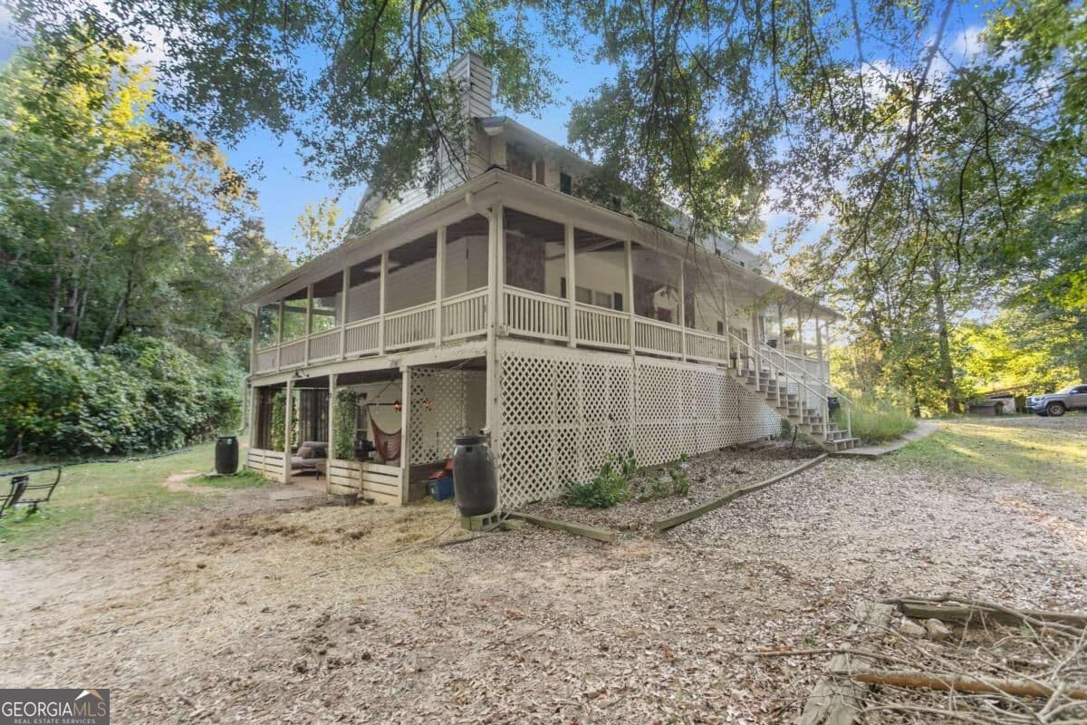 5 bedroom, 3 bathroom, 2,688 sq ft single family residence for sale at 5387 Due West Road, Powder Springs, GA 30127 — photo 2