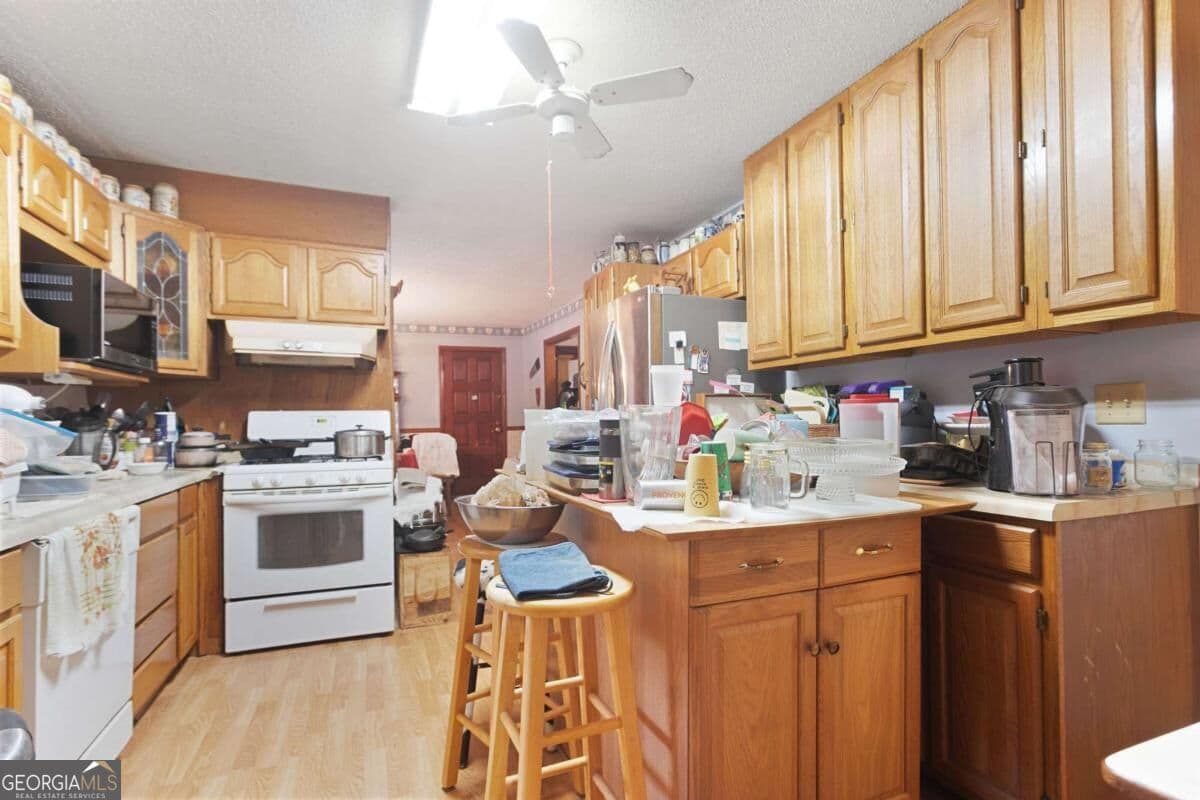 5 bedroom, 3 bathroom, 2,688 sq ft single family residence for sale at 5387 Due West Road, Powder Springs, GA 30127 — photo 3