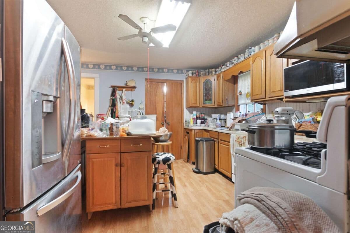 5 bedroom, 3 bathroom, 2,688 sq ft single family residence for sale at 5387 Due West Road, Powder Springs, GA 30127 — photo 5