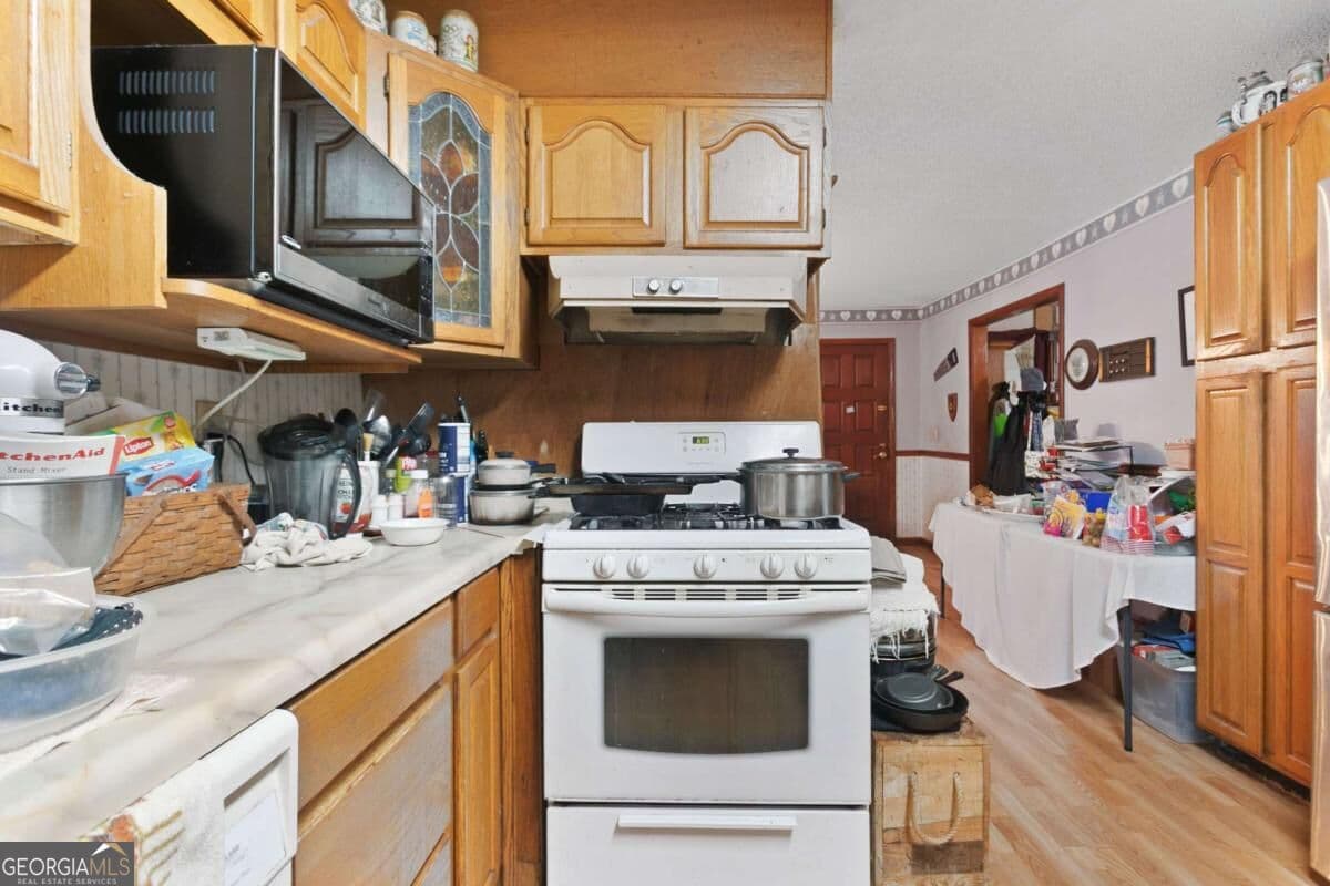 5 bedroom, 3 bathroom, 2,688 sq ft single family residence for sale at 5387 Due West Road, Powder Springs, GA 30127 — photo 4