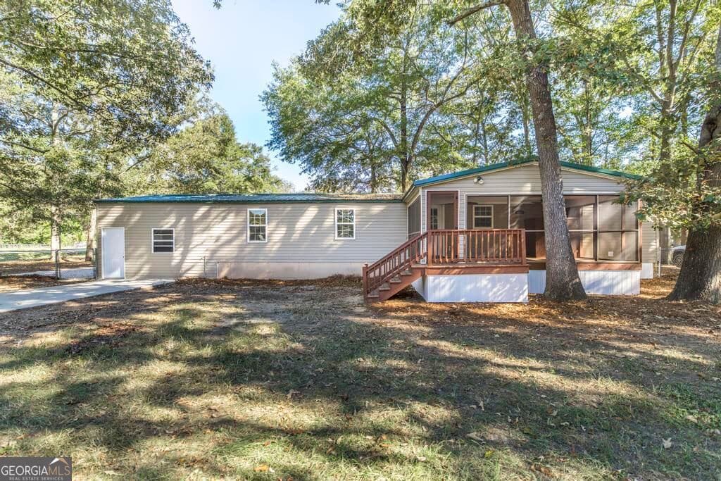 3 bedroom, 2 bathroom, 1,344 sq ft manufactured home,single family residence under contract at 100 Pine Street, Elko, GA 31025 — photo 2