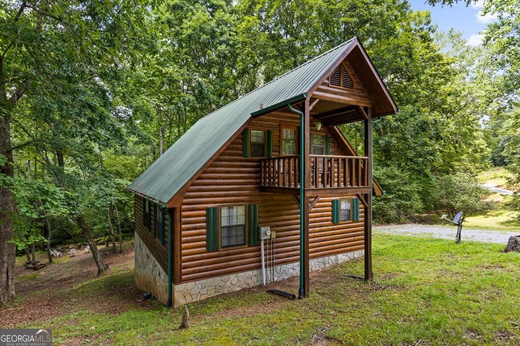 2 bedroom, 2 bathroom, 975 sq ft cabin,single family residence for sale at 135 The Builders Hill, Morganton, GA 30560 — photo 2