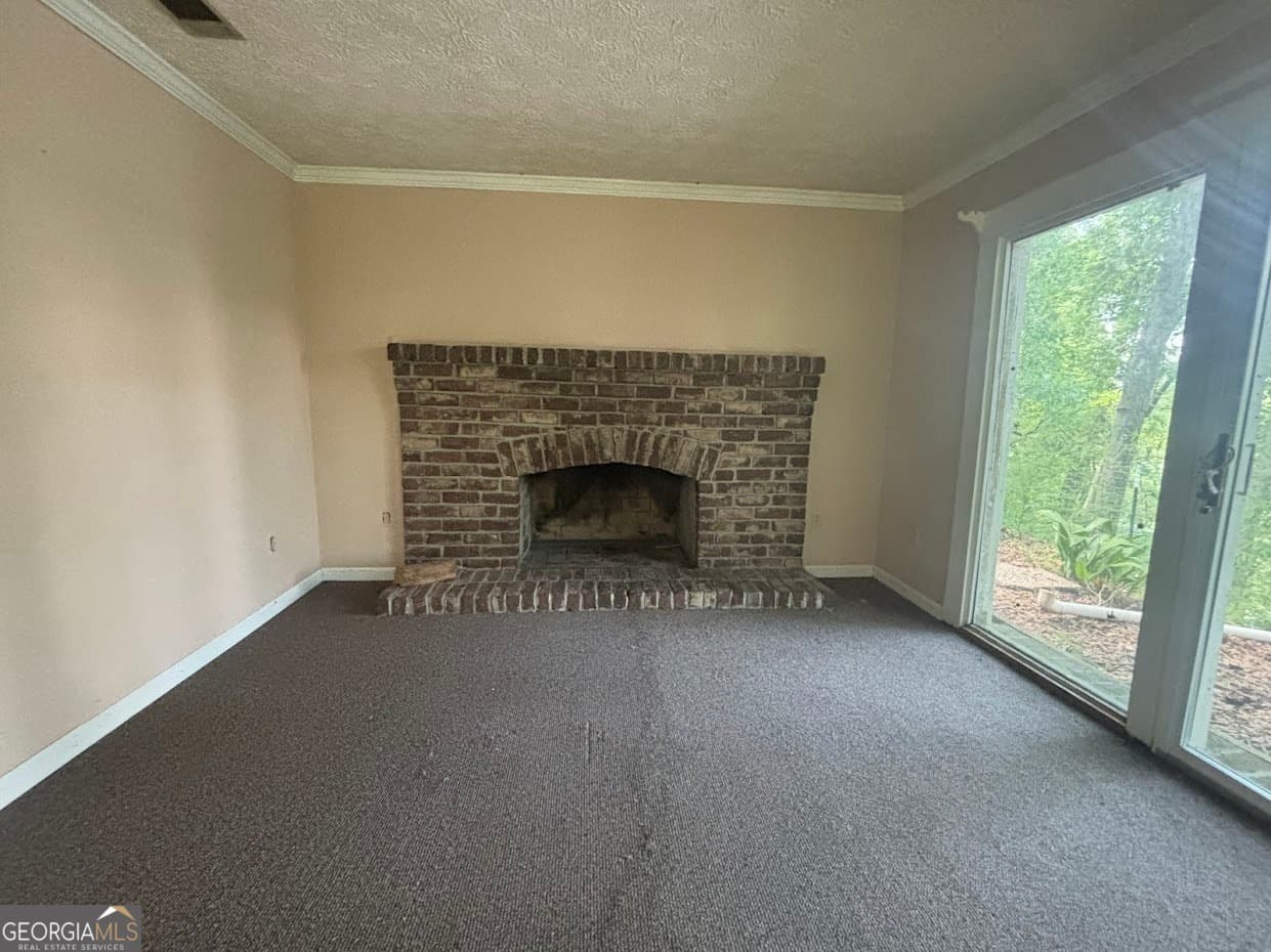 1 bedroom, 1 bathroom, 980 sq ft single family residence for sale at 282 Tuckasee King Road, Clyo, GA 31303 — photo 3