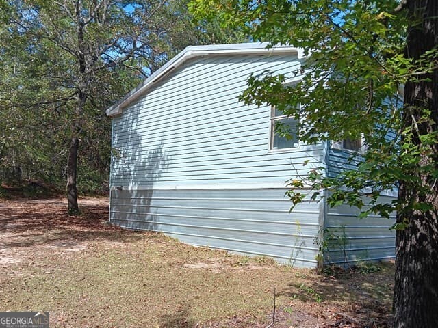 3 bedroom, 2 bathroom, 1,904 sq ft manufactured home,single family residence under contract at 176 Pineland Estates Road, Cochran, GA 31014 — photo 7