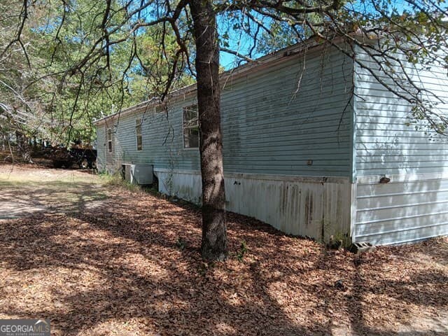 3 bedroom, 2 bathroom, 1,904 sq ft manufactured home,single family residence under contract at 176 Pineland Estates Road, Cochran, GA 31014 — photo 8