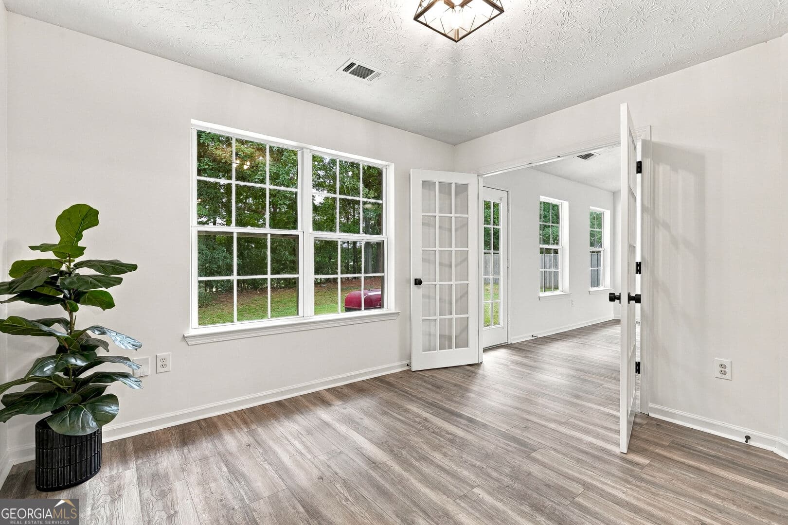 4 bedroom, 2 bathroom single family residence for sale at 3590 Hamilton Creek Trail, Buford, GA 30519 — photo 6