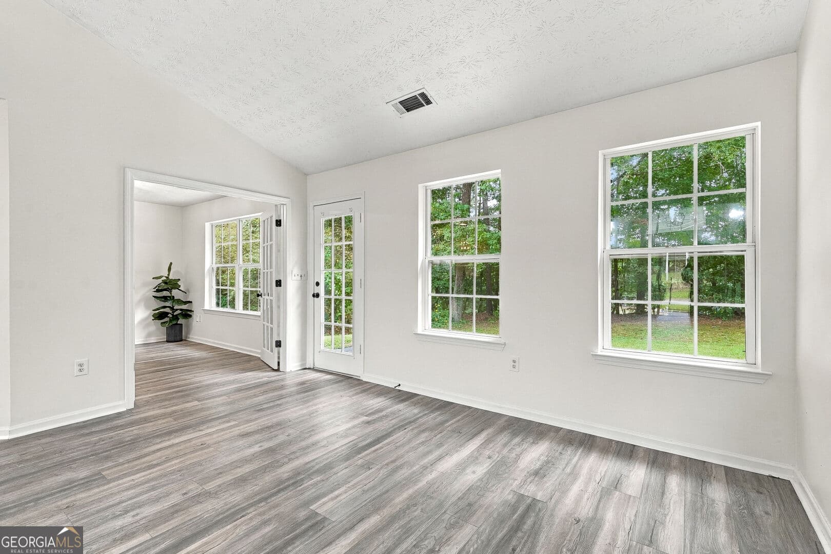 4 bedroom, 2 bathroom single family residence for sale at 3590 Hamilton Creek Trail, Buford, GA 30519 — photo 8