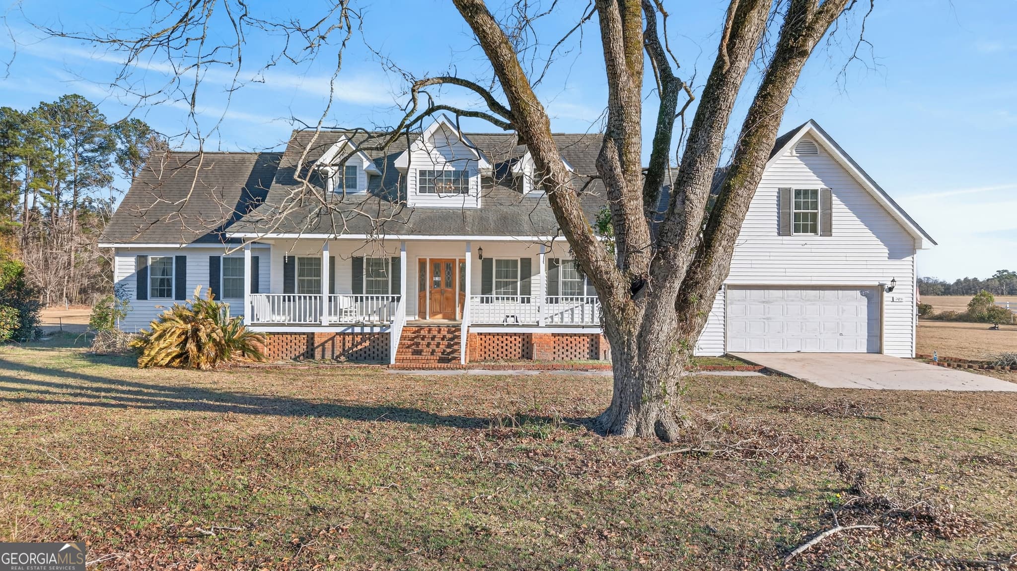 4 bedroom, 2.5 bathroom, 2,904 sq ft single family residence for sale at 2051 Oliver Highway, Newington, GA 30446 — photo 2