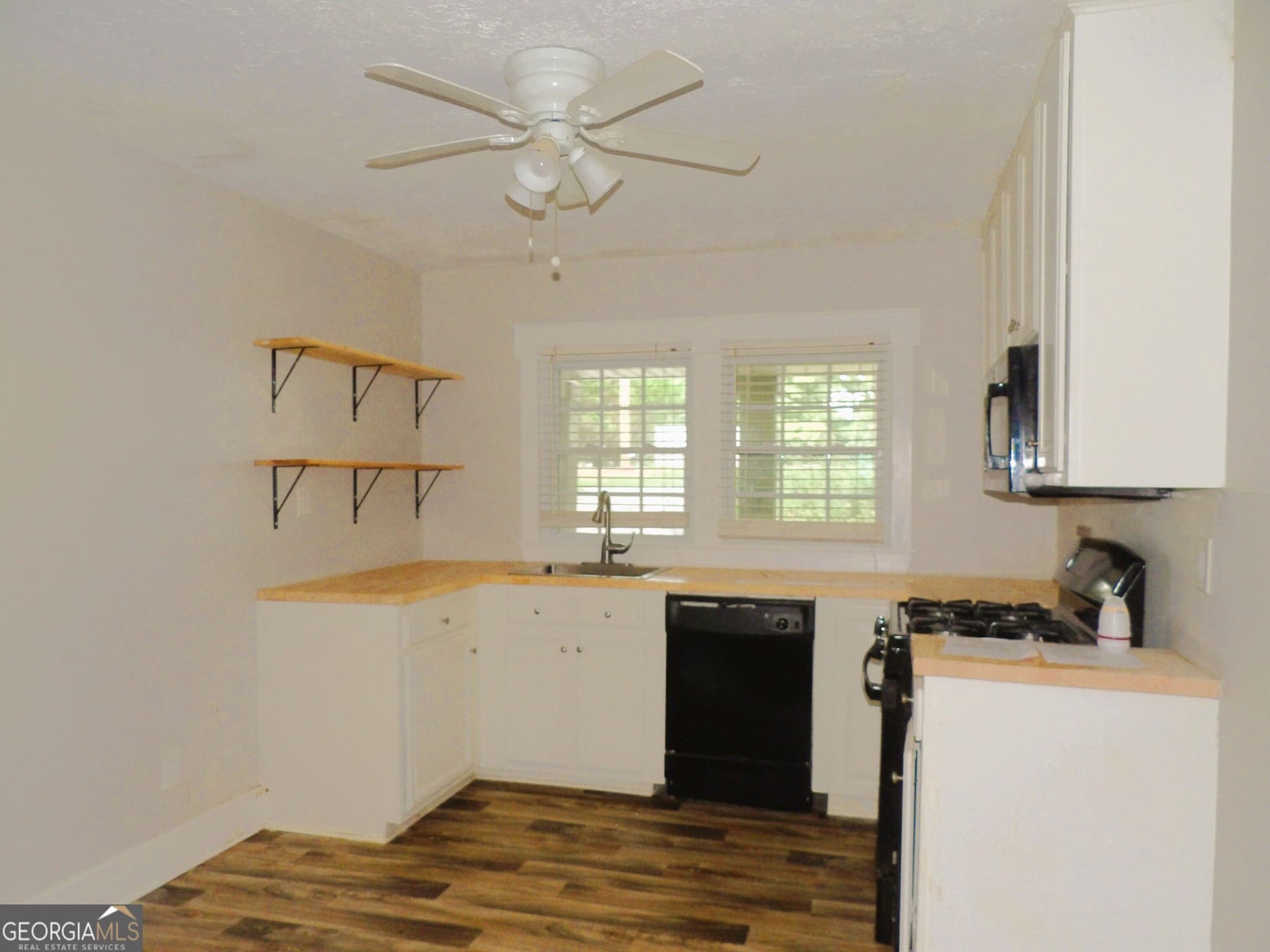 4 bedroom, 2 bathroom, 1,938 sq ft single family residence for sale at 202 Lovvorn Road, Carrollton, GA 30117 — photo 6