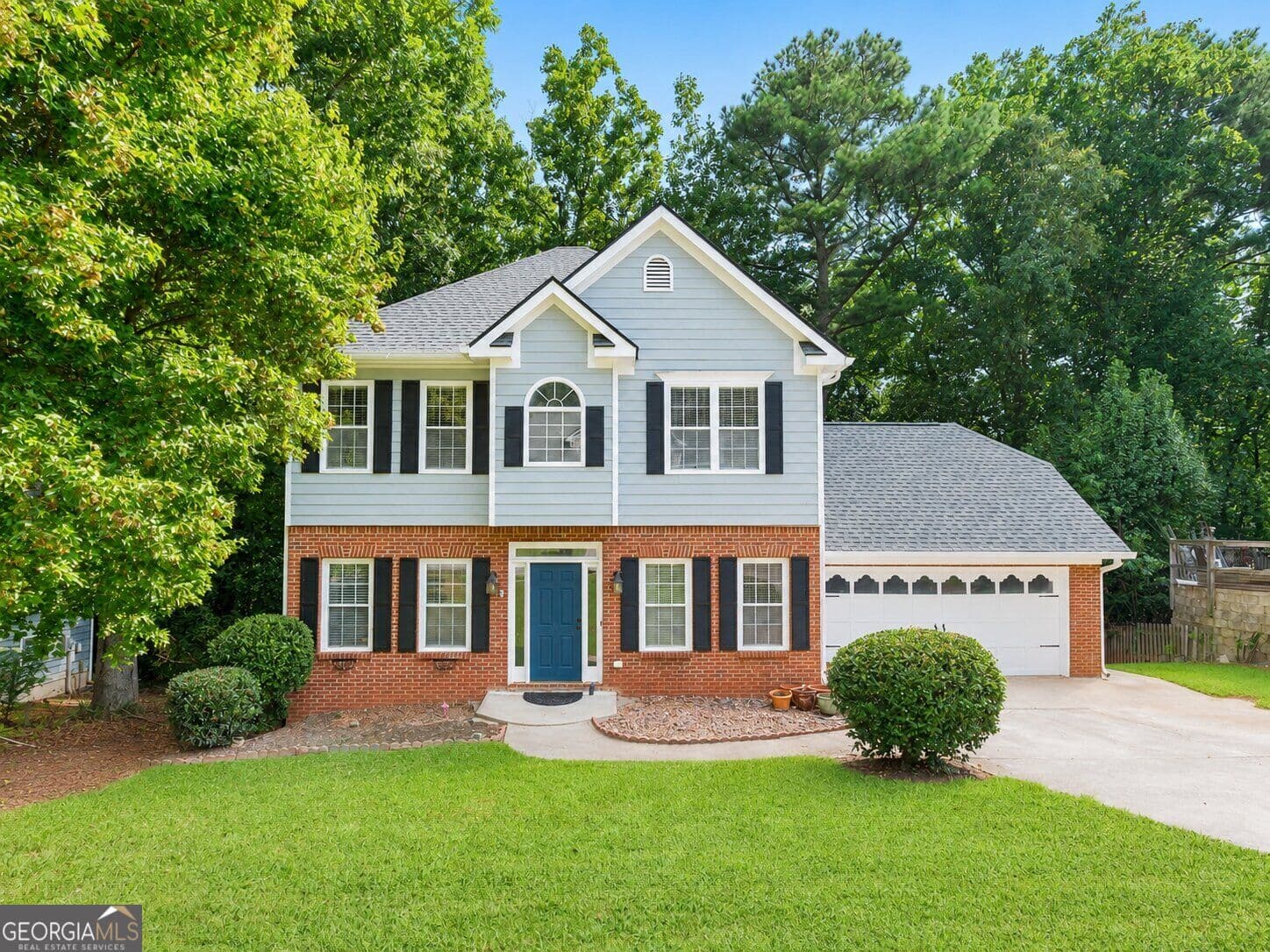 3 bedroom, 2.5 bathroom, 2,043 sq ft single family residence for sale at 2038 Spicers Lane, Woodstock, GA 30189 — photo 1 of 53