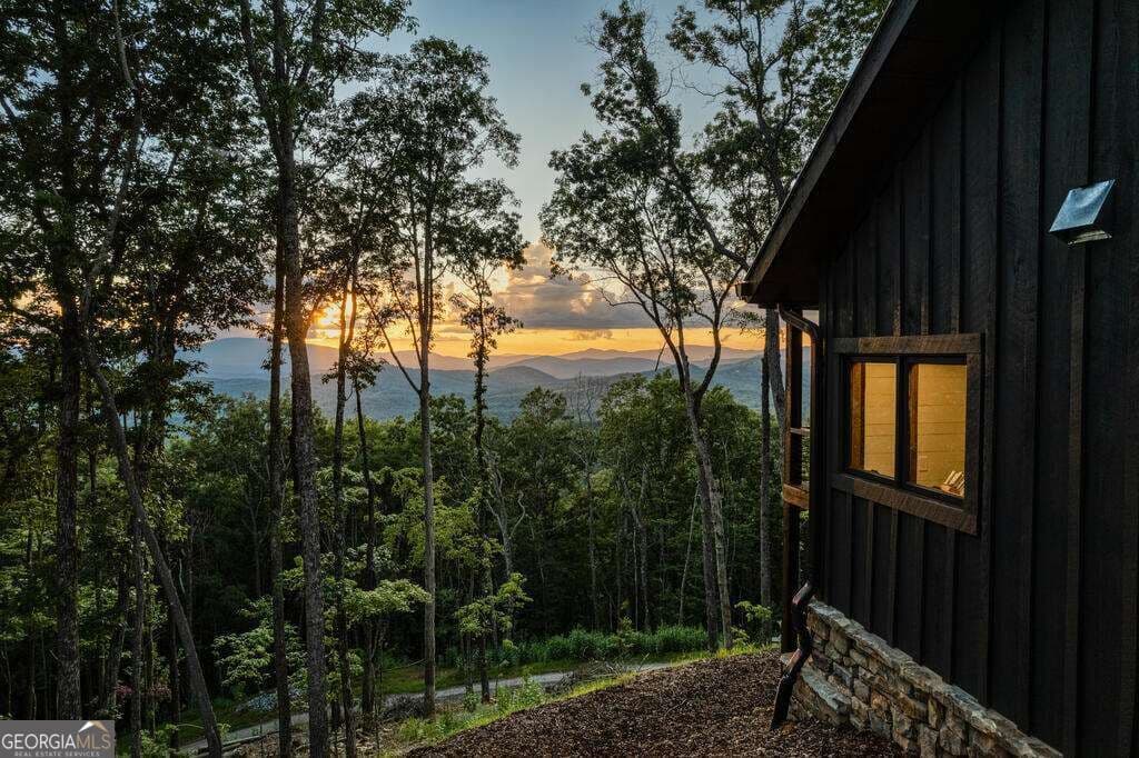 4 bedroom, 3.5 bathroom, 4,632 sq ft cabin,single family residence for sale at 91 Kittatinny Drive, Mineral Bluff, GA 30559 — photo 5
