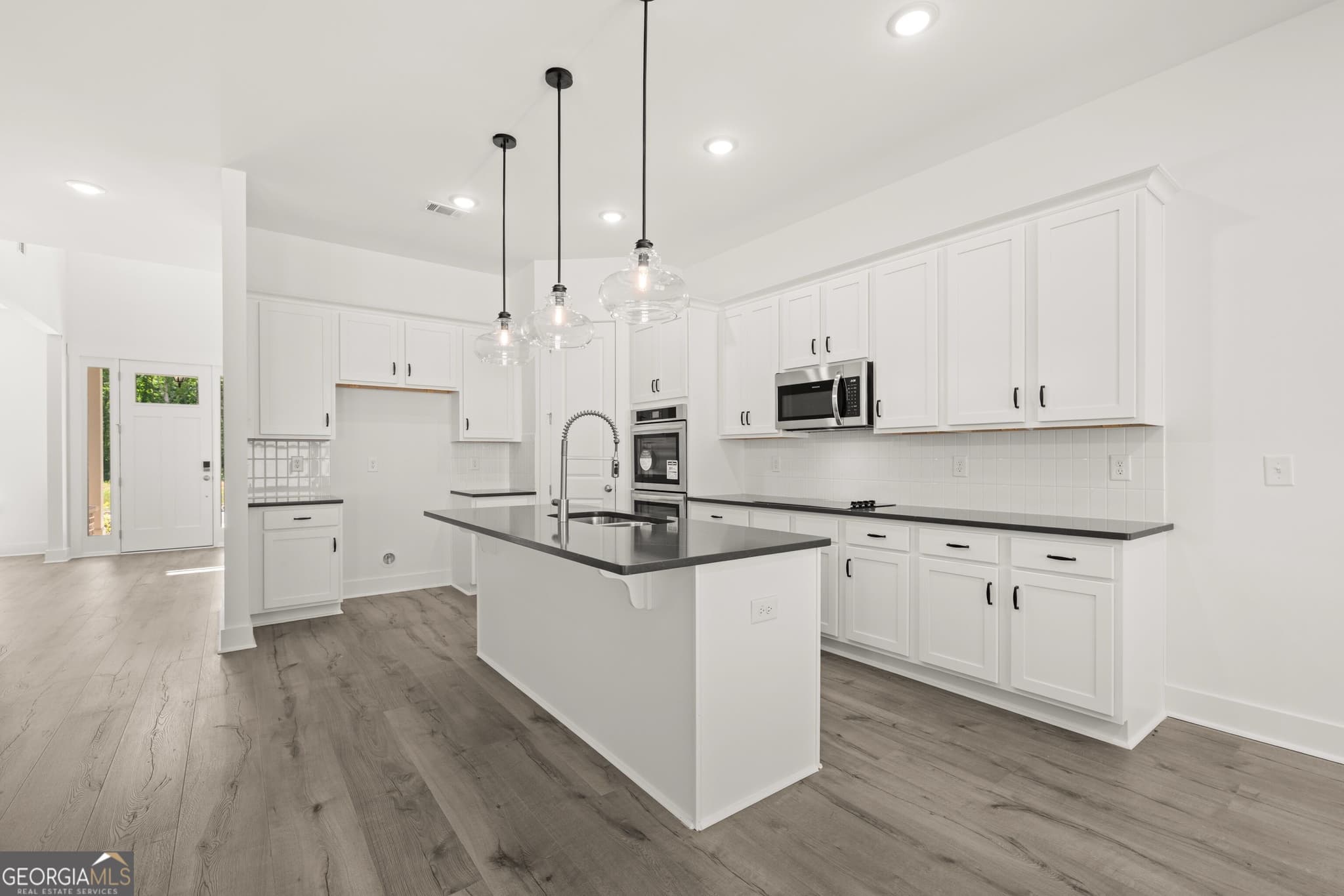5 bedroom, 4 bathroom, 3,207 sq ft single family residence for sale at 3354 Traditions Way 11V, Jefferson, GA 30549 — photo 7