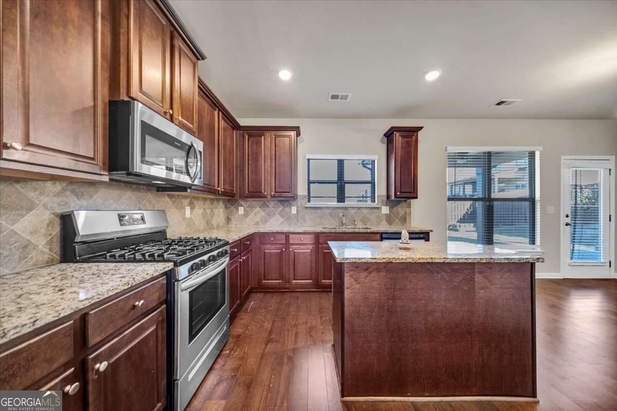 4 bedroom, 2.5 bathroom, 2,564 sq ft single family residence for sale at 1267 Swamp Road, Loganville, GA 30052 — photo 5