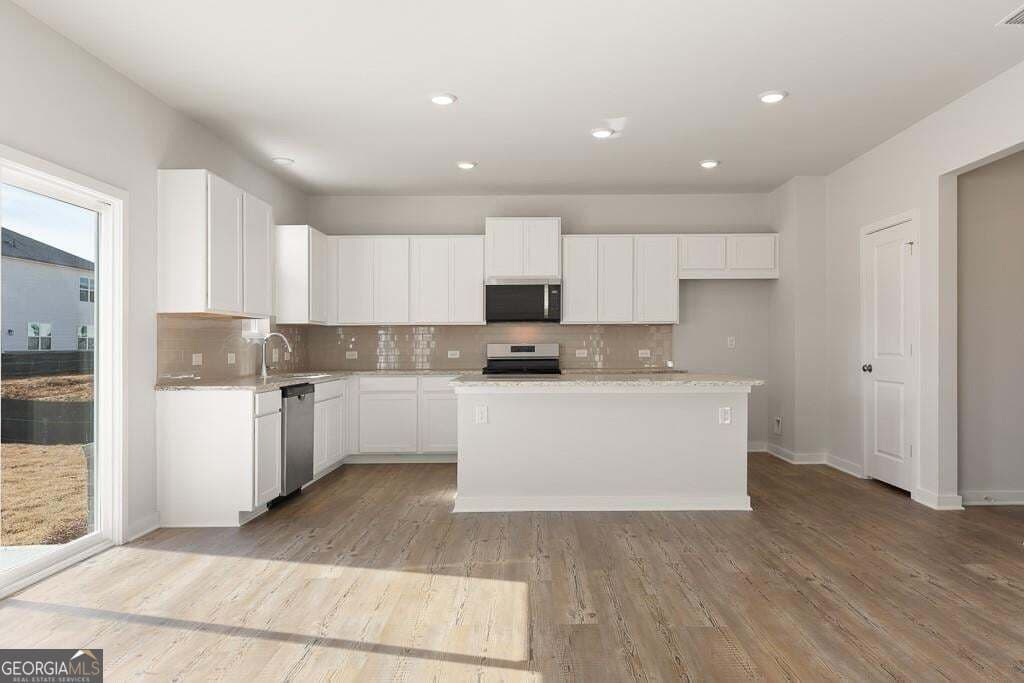 5 bedroom, 4 bathroom, 3,403 sq ft single family residence for sale at 5614 Rosehall Place, South Fulton, GA 30349 — photo 9