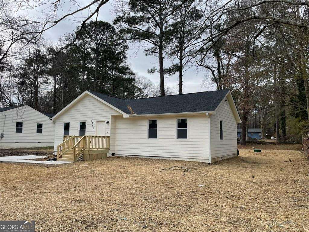 4 bedroom, 2.5 bathroom, 1,664 sq ft single family residence for sale at 5385 BOOKER T Drive, Morrow, GA 30260 — photo 3