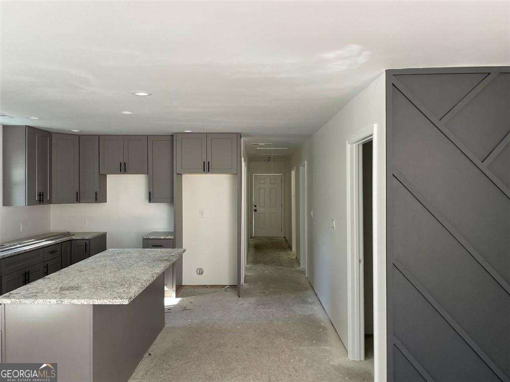 4 bedroom, 2.5 bathroom, 1,664 sq ft single family residence for sale at 5385 BOOKER T Drive, Morrow, GA 30260 — photo 5