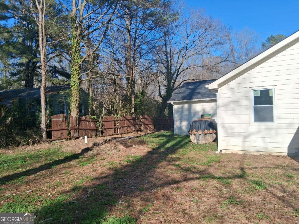 4 bedroom, 2.5 bathroom, 1,664 sq ft single family residence for sale at 5385 BOOKER T Drive, Morrow, GA 30260 — photo 9