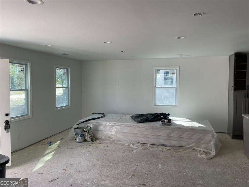4 bedroom, 2.5 bathroom, 1,664 sq ft single family residence for sale at 5385 BOOKER T Drive, Morrow, GA 30260 — photo 4