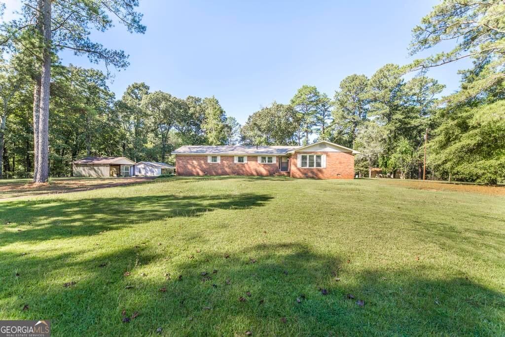 3 bedroom, 2 bathroom, 2,002 sq ft single family residence for sale at 1226 Rainey Road, Macon, GA 31220