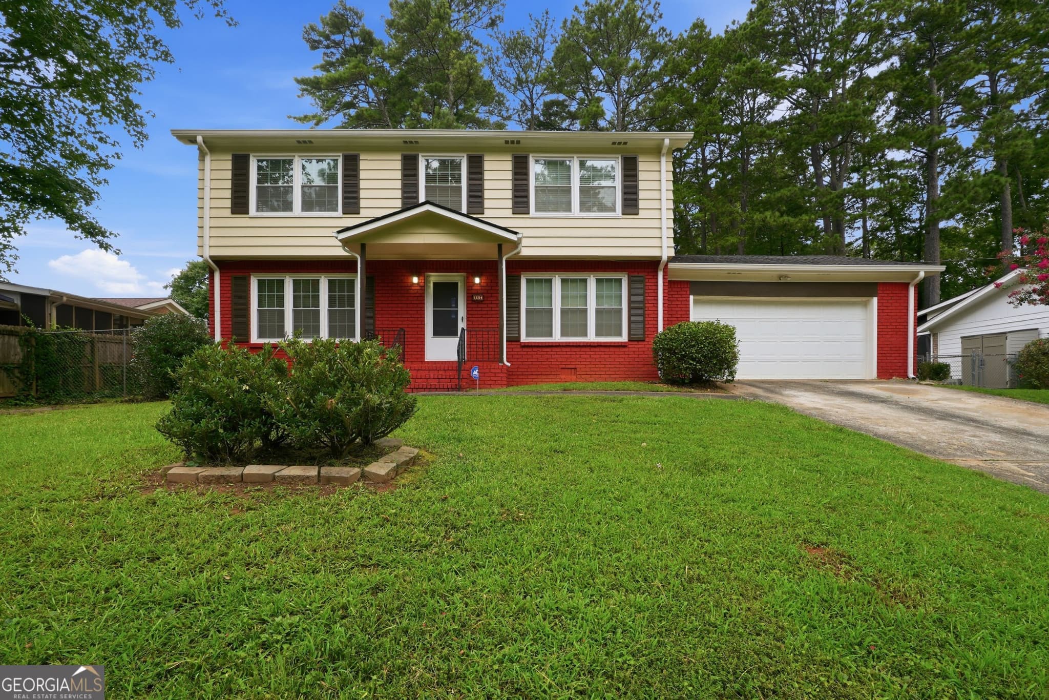 4 bedroom, 2.5 bathroom, 1,975 sq ft single family residence for sale at 1604 Drayton Woods Drive, Tucker, GA 30084