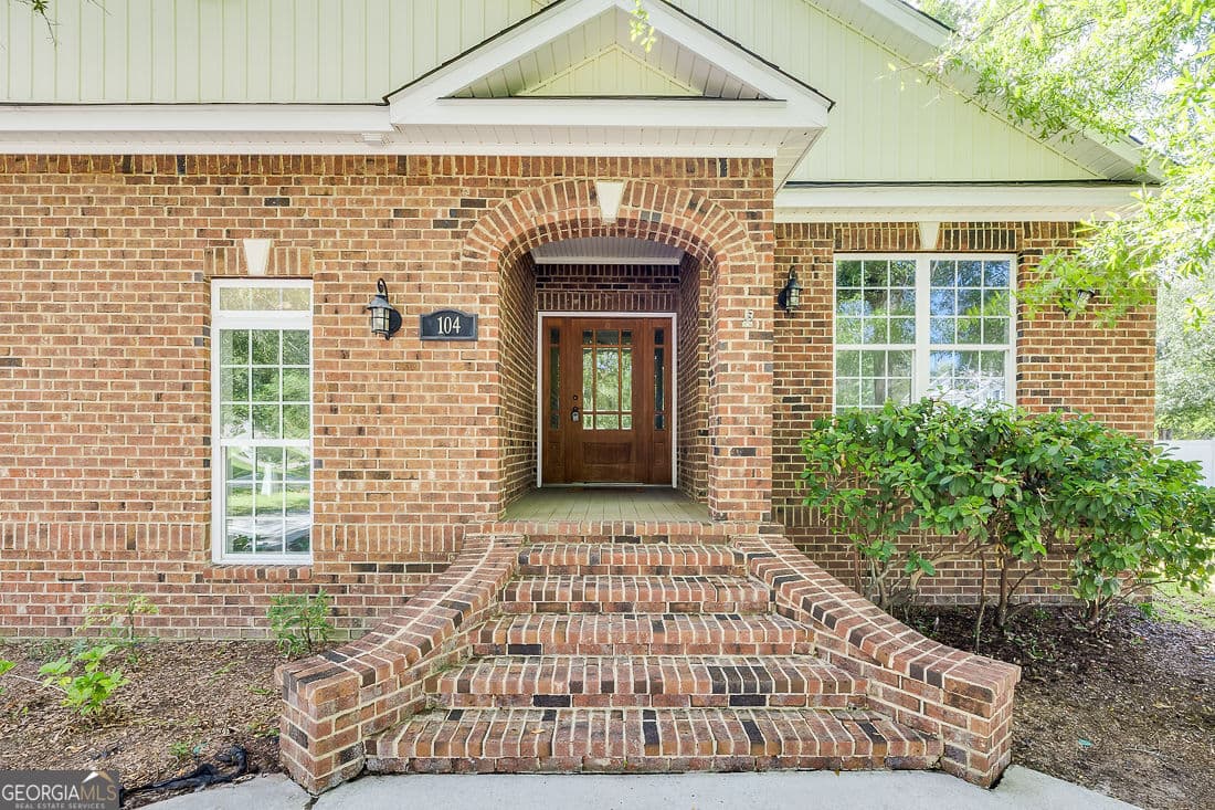 4 bedroom, 3 bathroom, 2,426 sq ft single family residence for sale at 104 Myrtlewood Court, Guyton, GA 31312 — photo 2