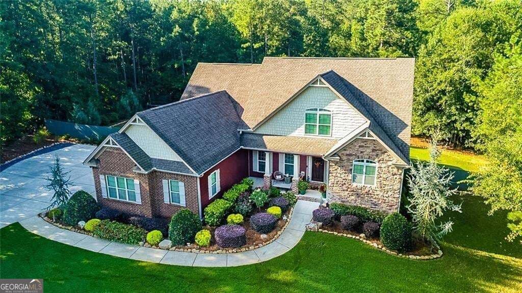 7 bedroom, 6 bathroom, 5,042 sq ft single family residence for sale at 209 Thyme Leaf Way, Locust Grove, GA 30248 — photo 2