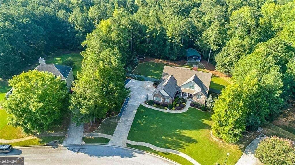 7 bedroom, 6 bathroom, 5,042 sq ft single family residence for sale at 209 Thyme Leaf Way, Locust Grove, GA 30248 — photo 6