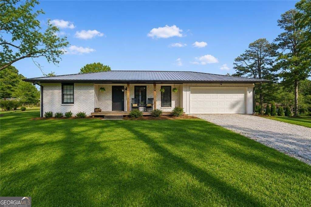 3 bedroom, 2 bathroom, 1,315 sq ft single family residence for sale at 4283 Hiram Lithia Springs Road, Powder Springs, GA 30127 — photo 1 of 30