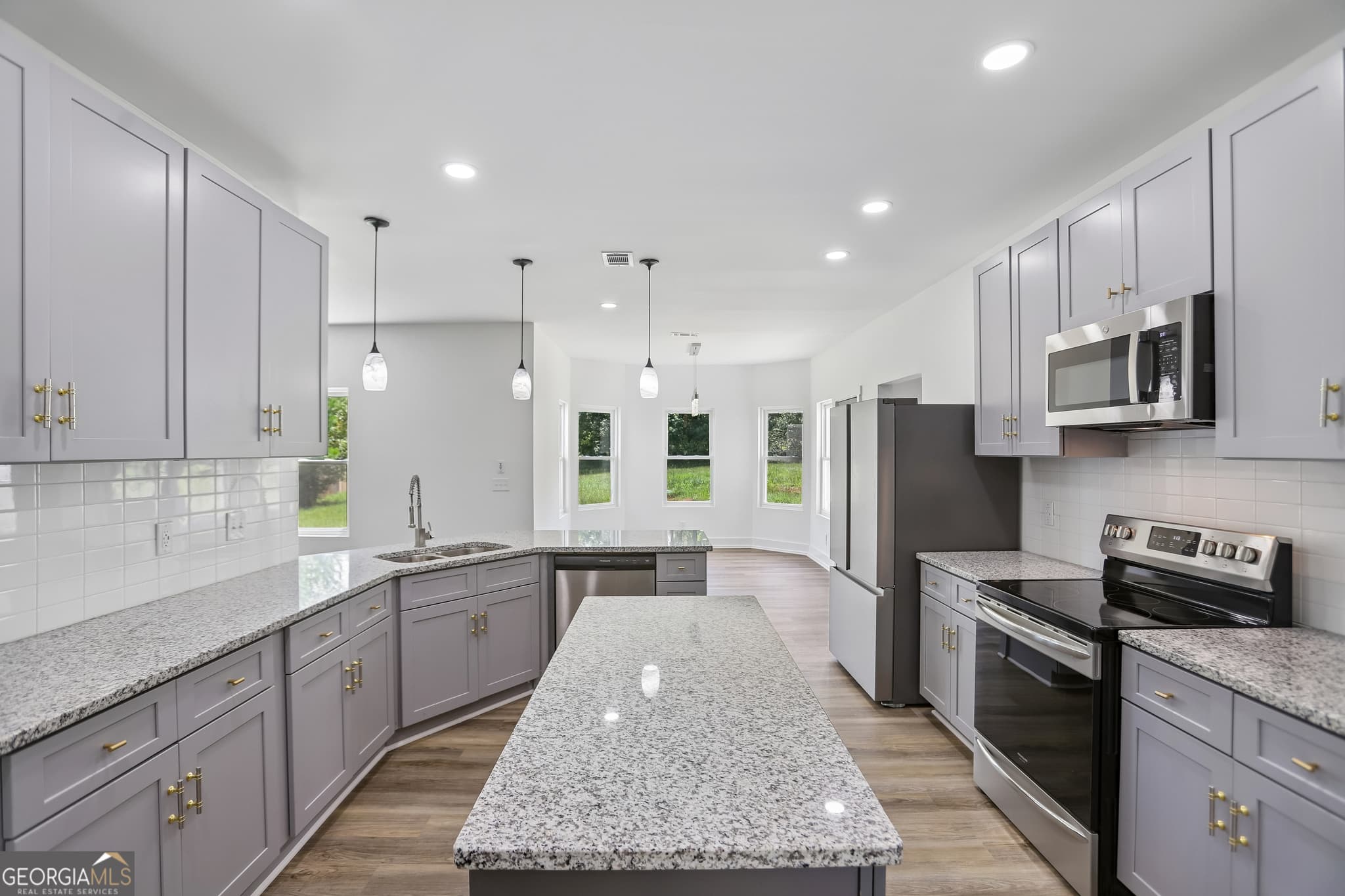 6 bedroom, 4 bathroom, 4,117 sq ft single family residence for sale at 35 Fourwood Drive, Covington, GA 30016 — photo 2