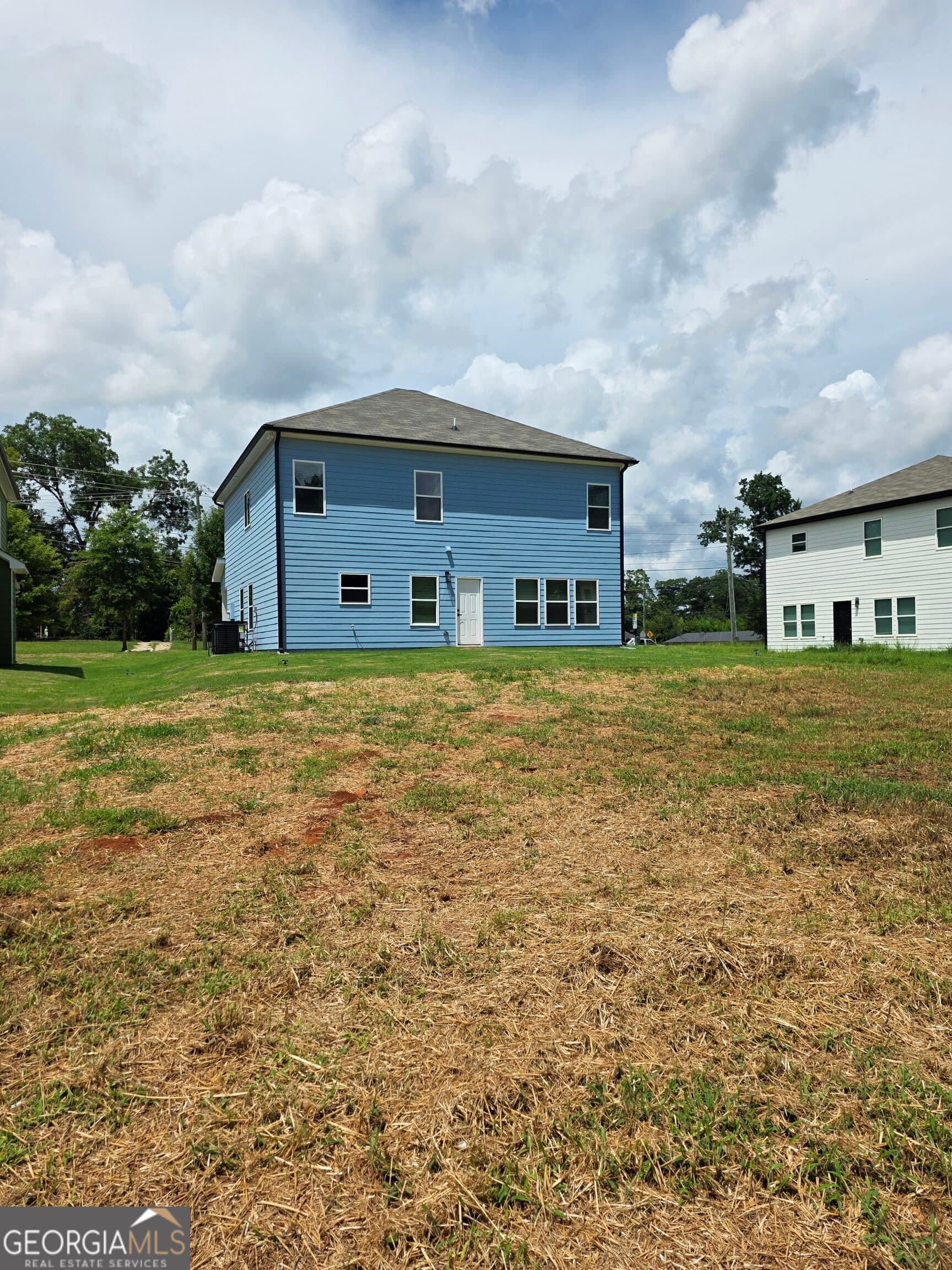 4 bedroom, 2.5 bathroom, 2,169 sq ft single family residence for sale at 448 N Hill Street, Griffin, GA 30223 — photo 4
