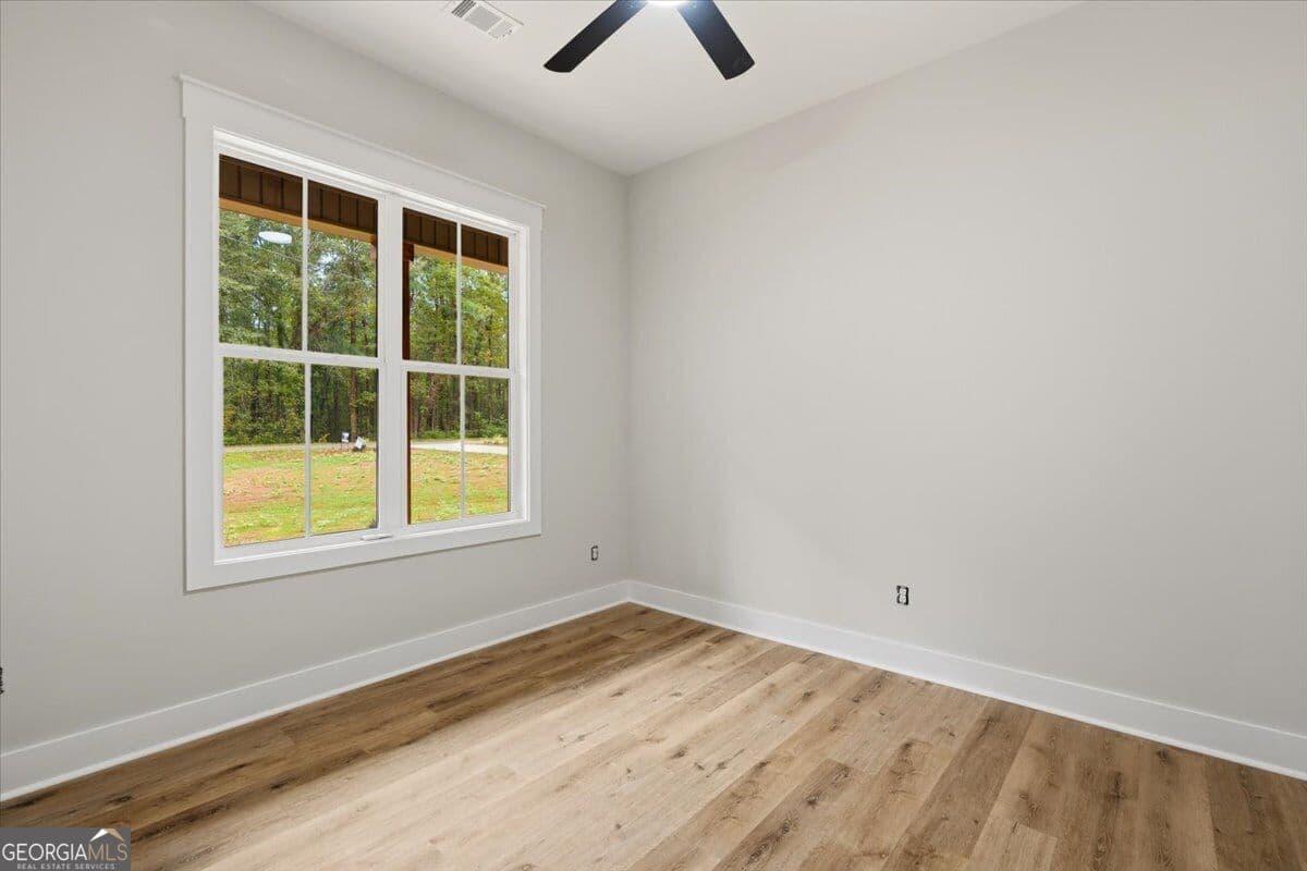 4 bedroom, 3.5 bathroom, 2,400 sq ft single family residence for sale at 36 Rock Quarry Road, Yatesville, GA 31097 — photo 6