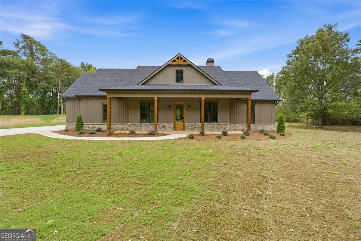 4 bedroom, 3.5 bathroom, 2,400 sq ft single family residence for sale at 36 Rock Quarry Road, Yatesville, GA 31097 — photo 1 of 27