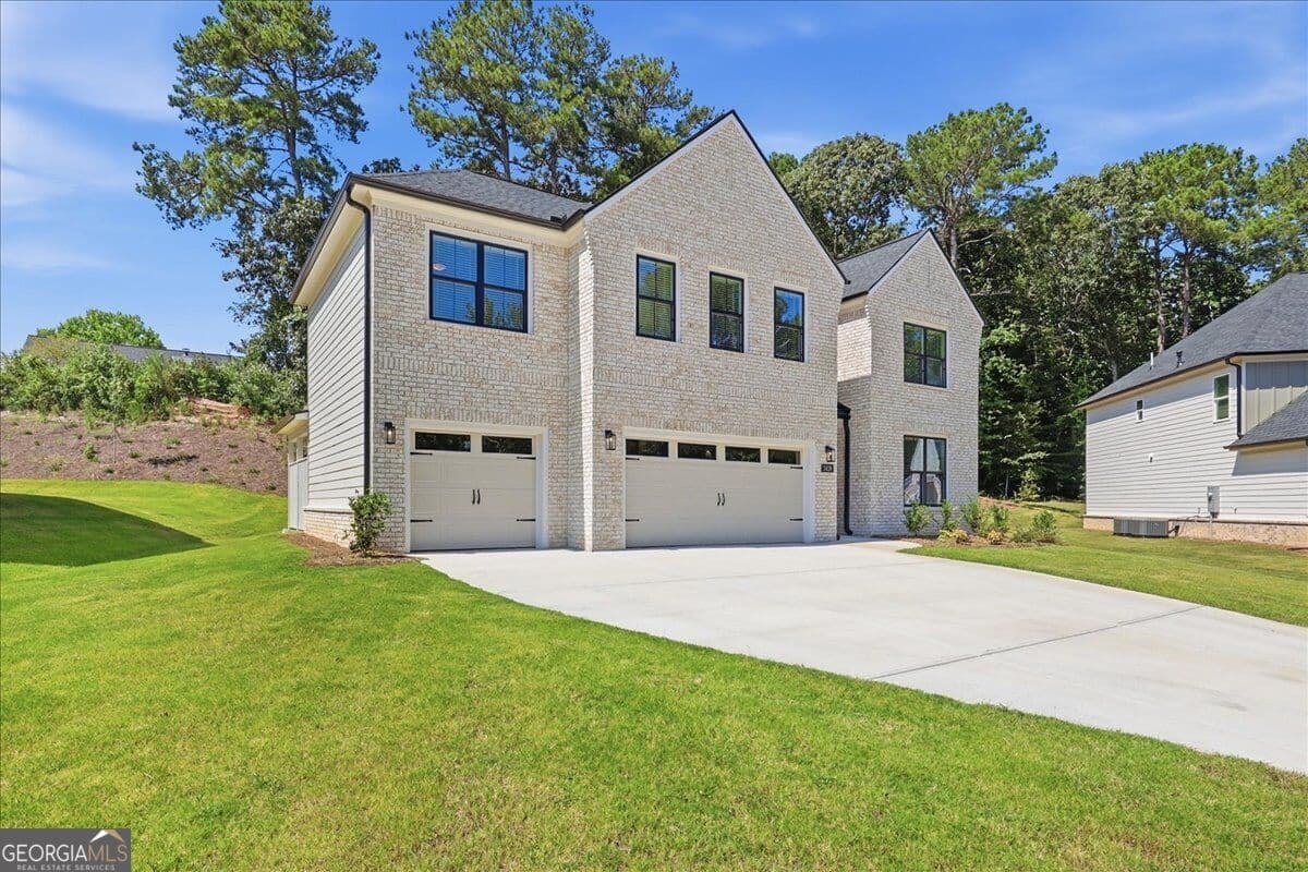 6 bedroom, 4 bathroom, 2,959 sq ft single family residence for sale at 2420 Reserve Manor Court, Lawrenceville, GA 30043 — photo 2